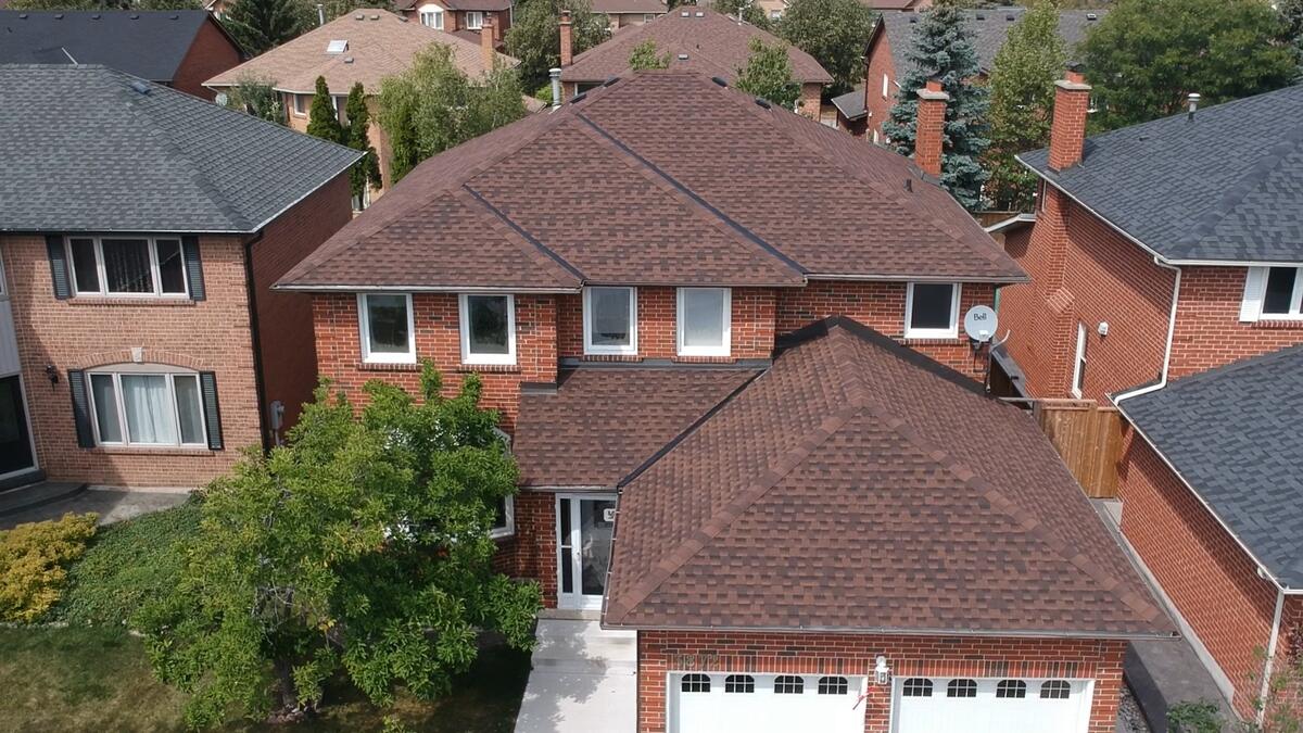 Drone view of a finished architectural shingle roof by Farnsworth Quality Roofing